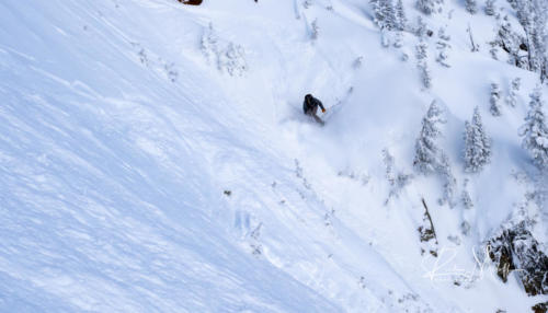 Vail Wall skiers left narrow chute - Photo taken by Rick Meloff, OneCutMedia - www.onecutmedia.ca